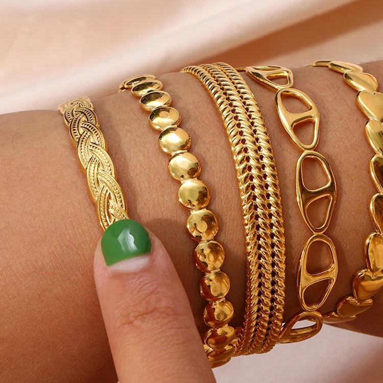 Claire Gevlochten Bangle Goud - Rosa Jewels