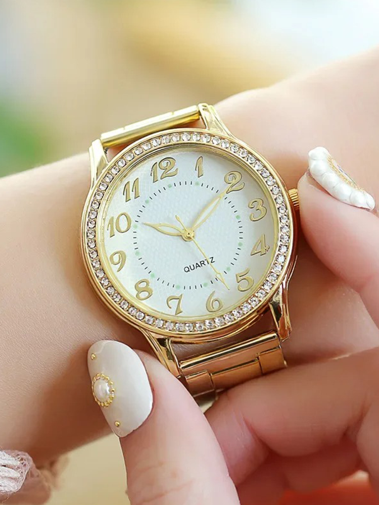 Eva Quartz Dames Horloge Met Ronde Kast En Zirkonia's Goud