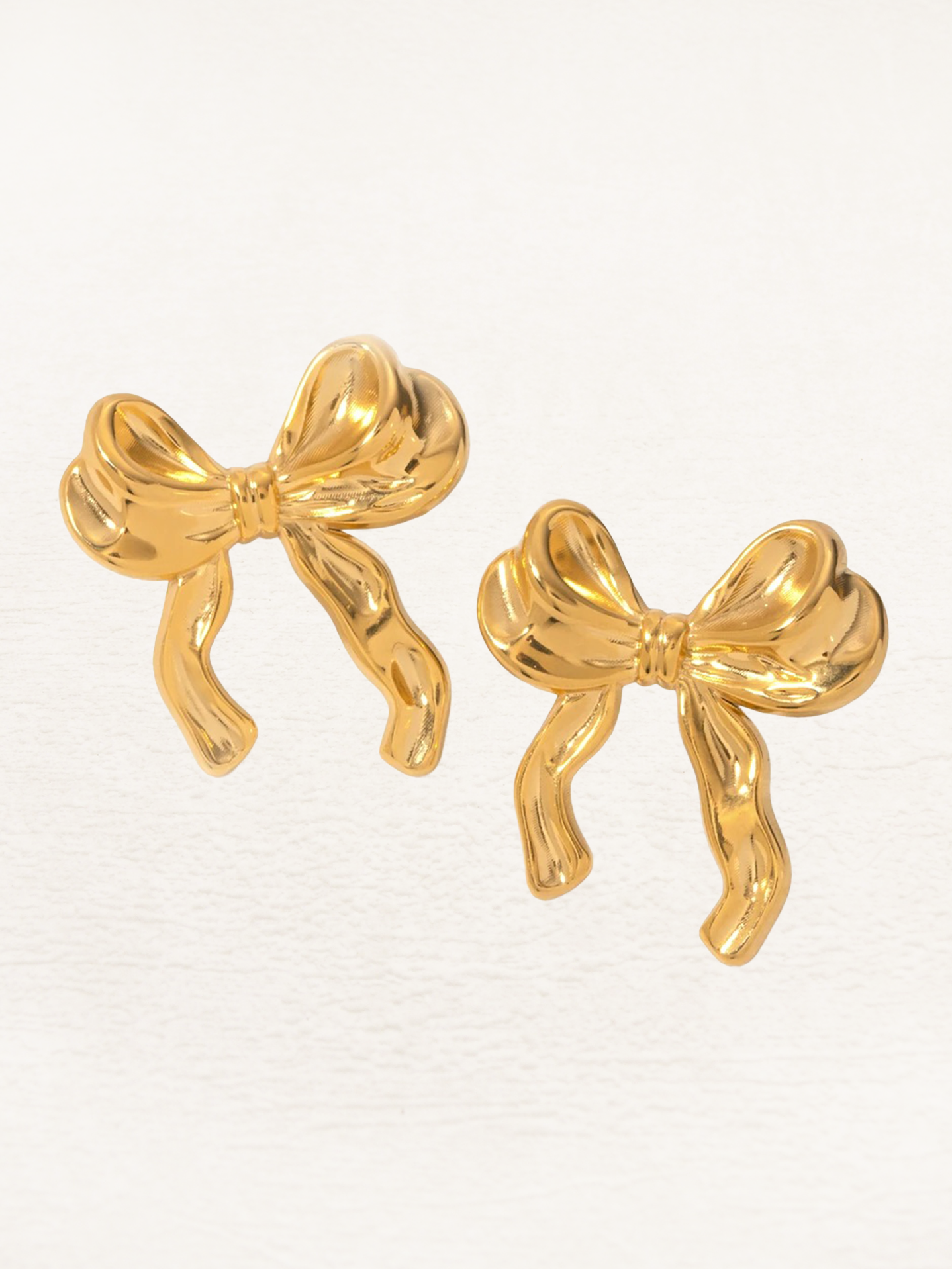 Rosanne Strikjes Oorbellen + Verstelbare Ring Goud