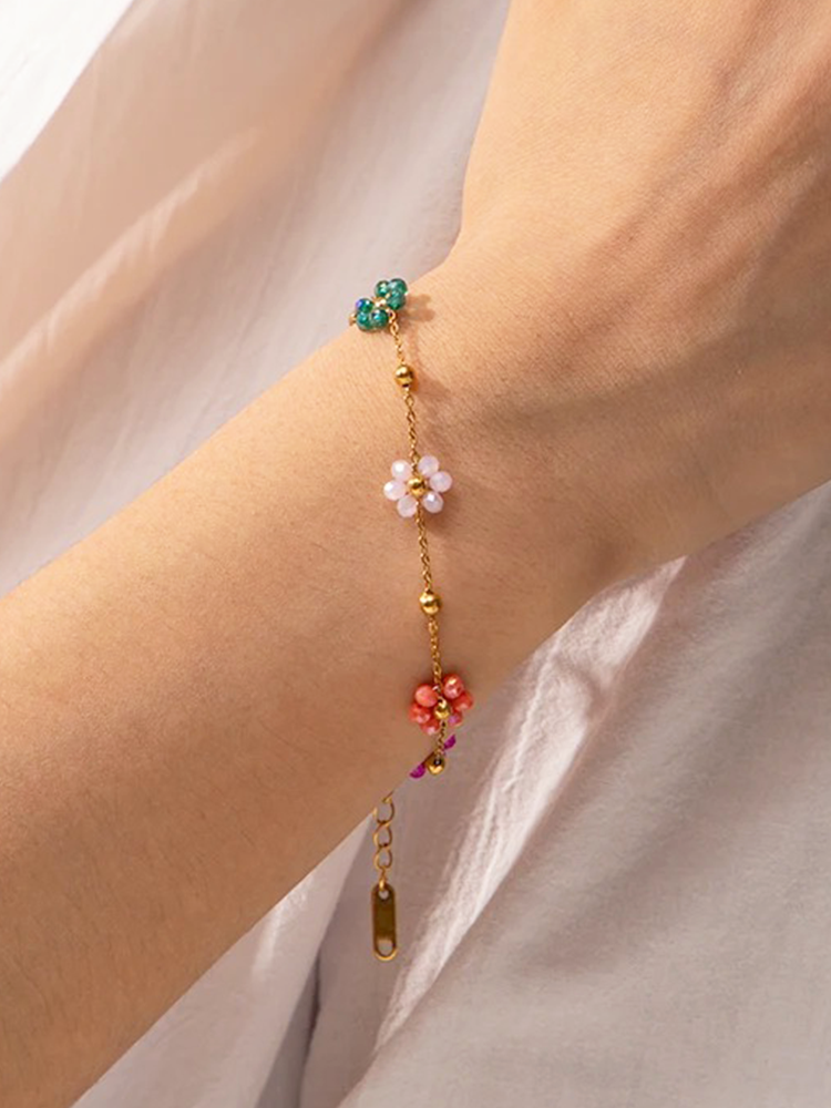 Roseline Gekleurde Bloemetjes Armband Goud