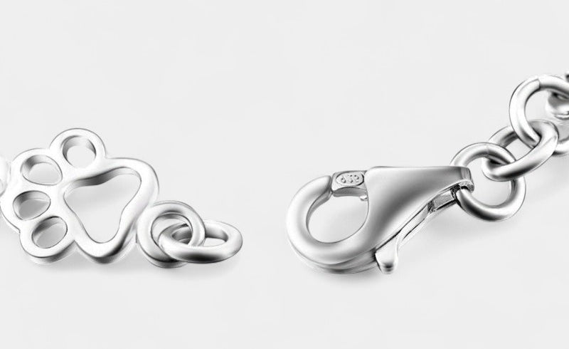 Virelle-Armband-Virelle | Dames armband – sterling zilver, pootafdruk- en botmotief, verfijnde schakelstructuur