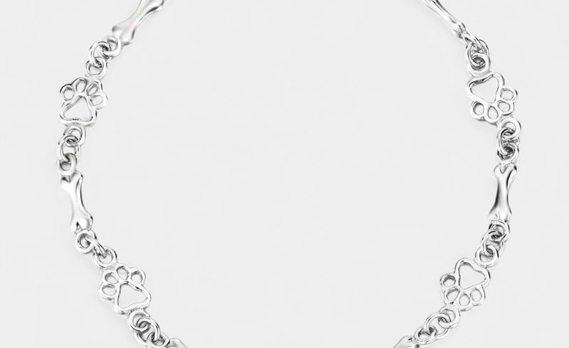 Virelle-Armband-Virelle | Dames armband – sterling zilver, pootafdruk- en botmotief, verfijnde schakelstructuur