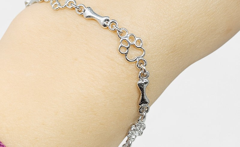 Virelle-Armband-Virelle | Dames armband – sterling zilver, pootafdruk- en botmotief, verfijnde schakelstructuur