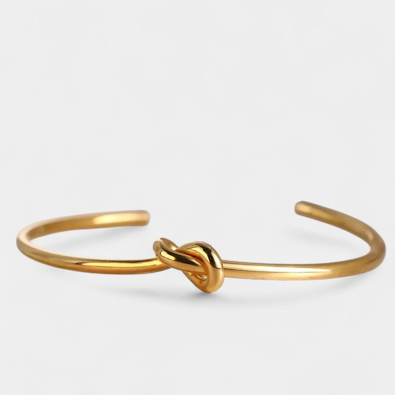 Virelle-Jewelry Bracelet Bangle-Virelle Armband - Elegante twisted knot bangle in goud