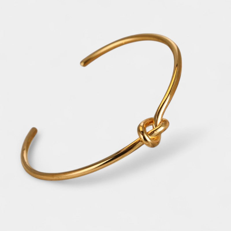 Virelle-Jewelry Bracelet Bangle-Virelle Armband - Elegante twisted knot bangle in goud