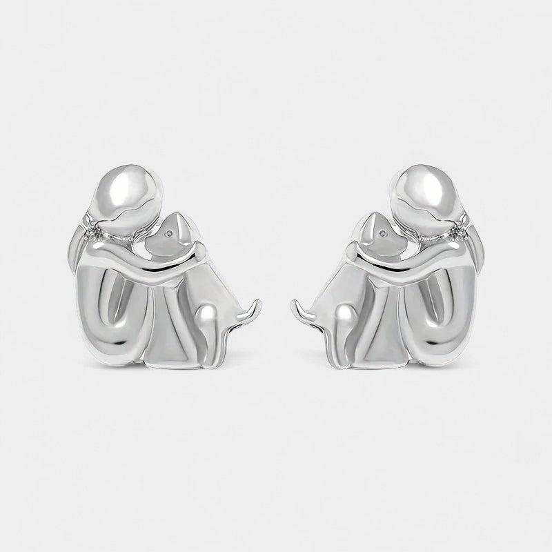 Virelle-Oorstekers-Virelle | Dames oorstekers – roestvrij staal, tweekleurig ontwerp, omhelzende figuur met hond
