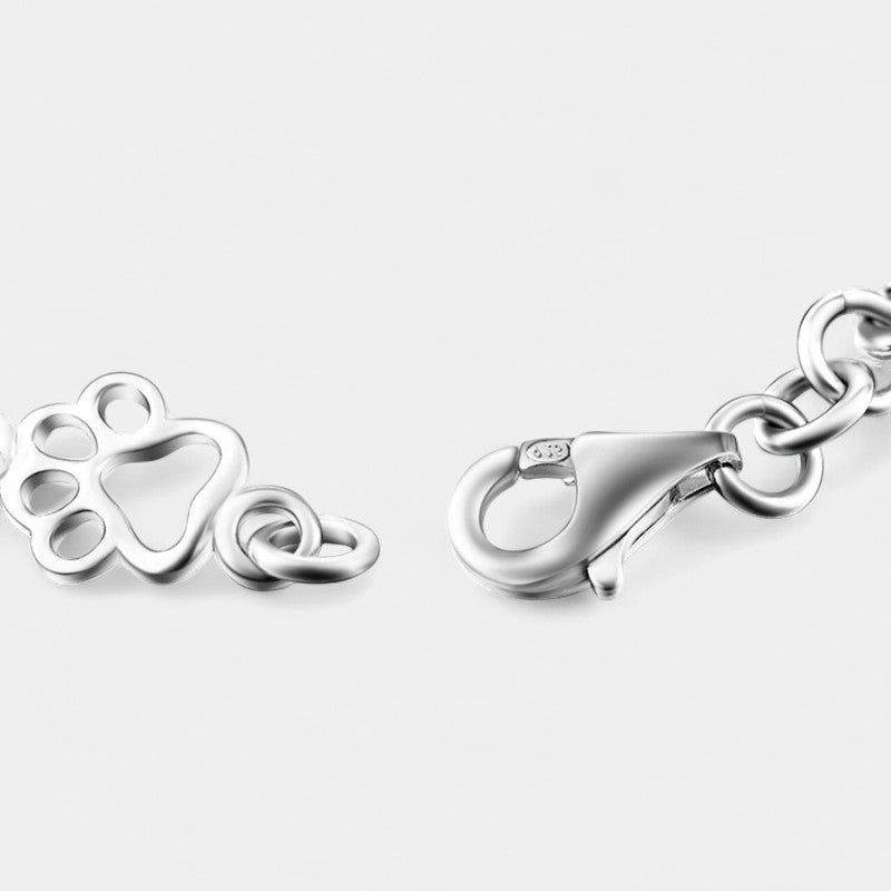 Virelle-Armband-Virelle | Dames armband – sterling zilver, pootafdruk- en botmotief, verfijnde schakelstructuur
