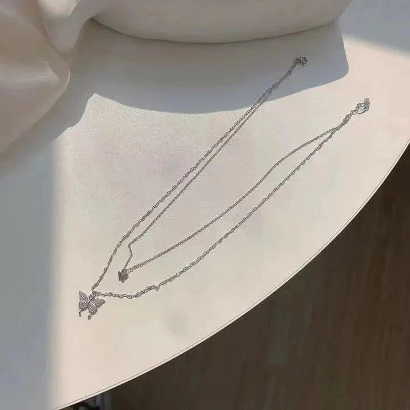 Virelle-Jewelry-Virelle | Dames Ketting Set – Zilver, Dubbele Ketting, Glanzende Vlinderhanger