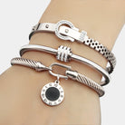 Virelle-Virelle | Dames Armband – Verguld roestvrij staal, Meervoudige lagen, Glanzende hangerdetails
