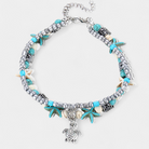 Virelle-Virelle | Dames enkelbandje – schildpad hanger, schelp details