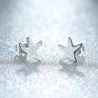 Virelle-Virelle | Damesoorbellen – Blauw opaal zeester-inleg, zilveren post